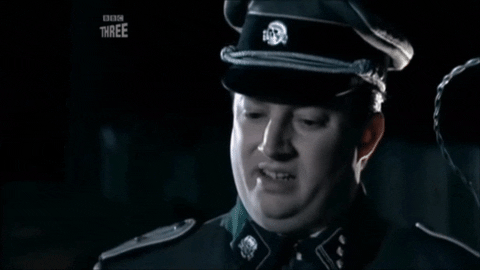 Man in Nazi uniform asking, "Are we the baddies?"